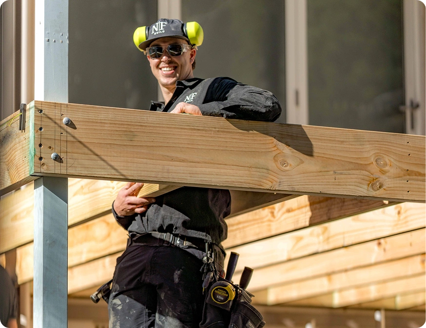 NF Build builder working on timber decking subframe structure