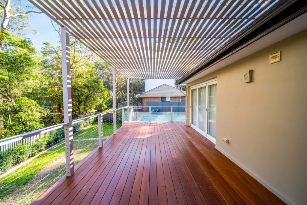 NF Build spacious timber outdoor deck with louvered pergola roof and wire balustrade